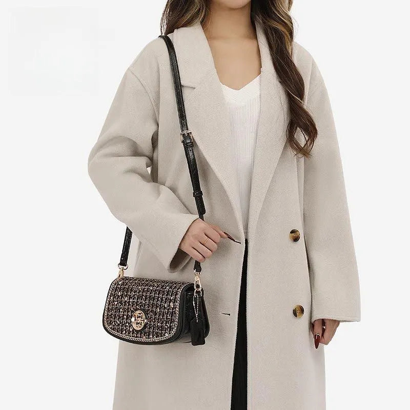 Black polyester crossbody underarm chain shoulder bag for commuting and leisure travel with chain detail