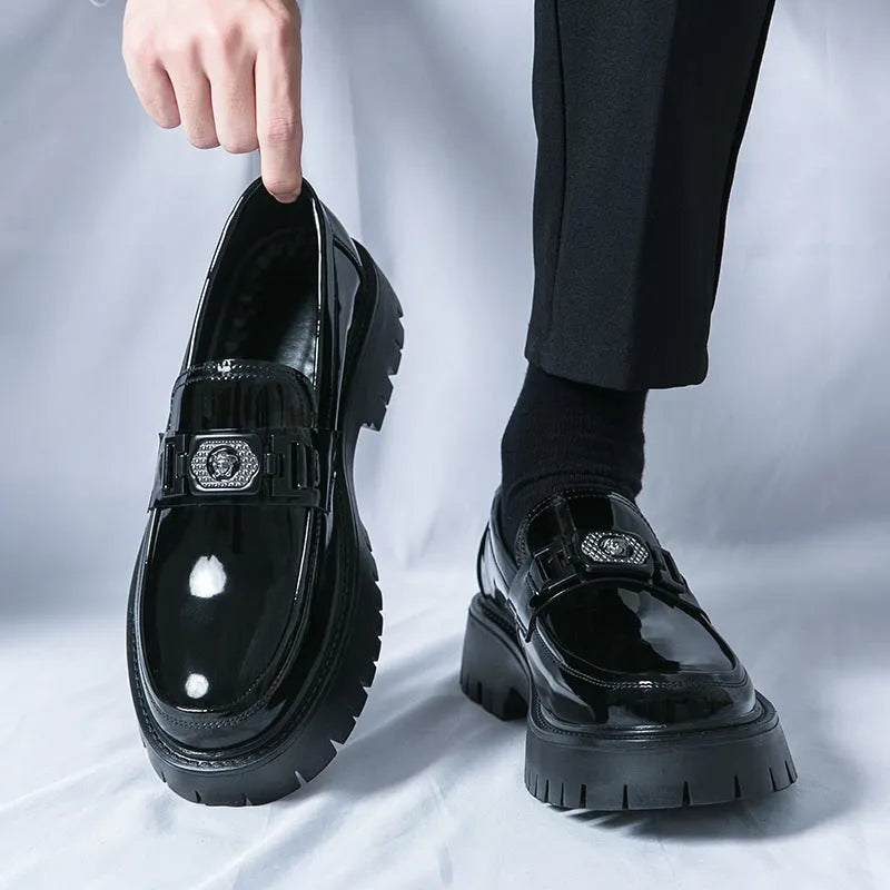 Men's glossy black PU leather loafers with a hidden low heel platform sole.