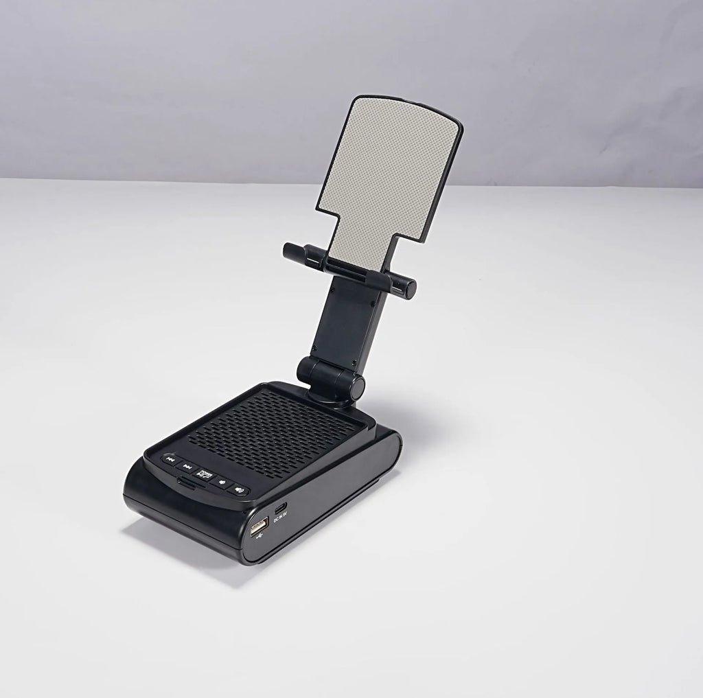 Multi-function lazy phone holder with Bluetooth audio speaker in black plastic, USB powered