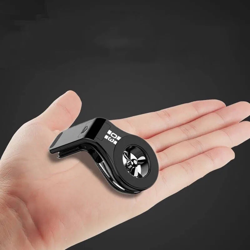 Magnetic car air vent phone holder with rotating paddle and fragrance slots in black, blue or red colour
