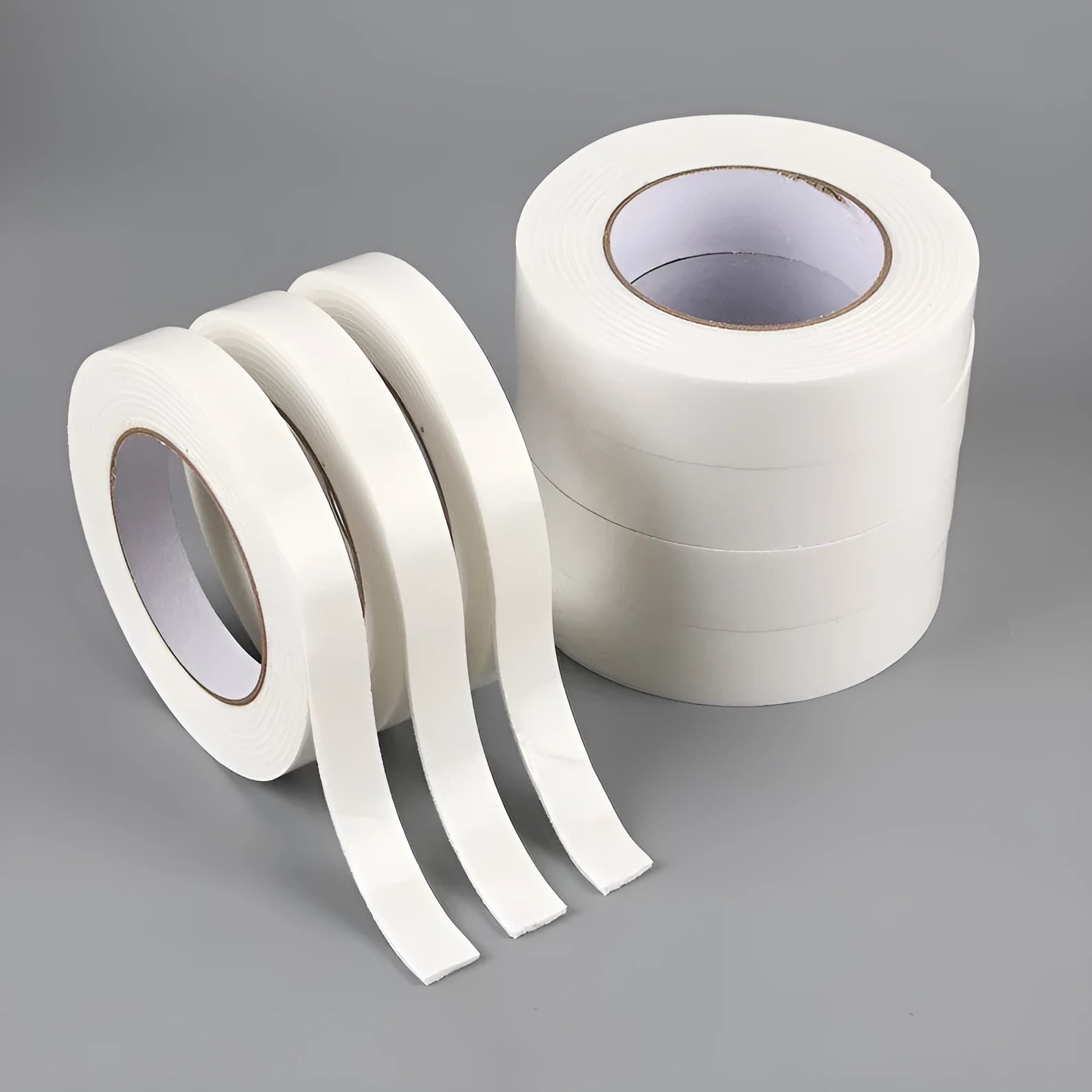 Roll of 3mm thick foam double-sided adhesive tape showing sponge core, with size options 15mm, 18mm, and 30mm wide.