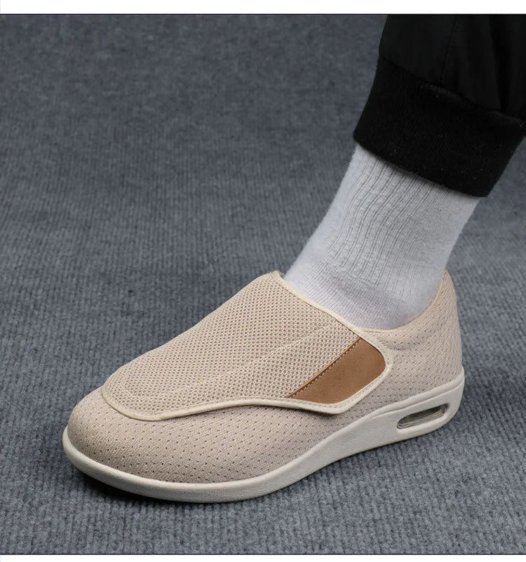 Wide fit elderly shoes with Velcro closure, round toe, and cushioned rubber sole in black colour option