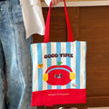 Cartoon print canvas handbag with kitten design measuring 30cm wide by 36cm high