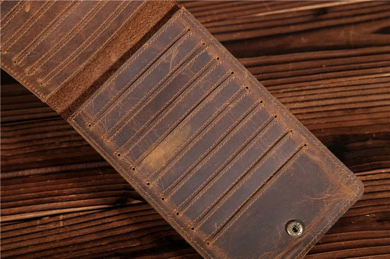 Men's black cowhide leather card holder wallet open to show 18 card slots, money pocket, and phone pocket.