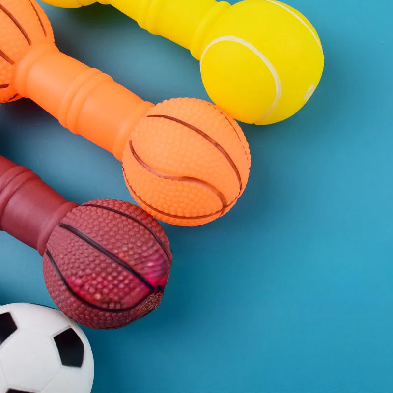 Brown, orange, white, and yellow coloured PVC football dumbbell shaped dog squeaky chew toy.
