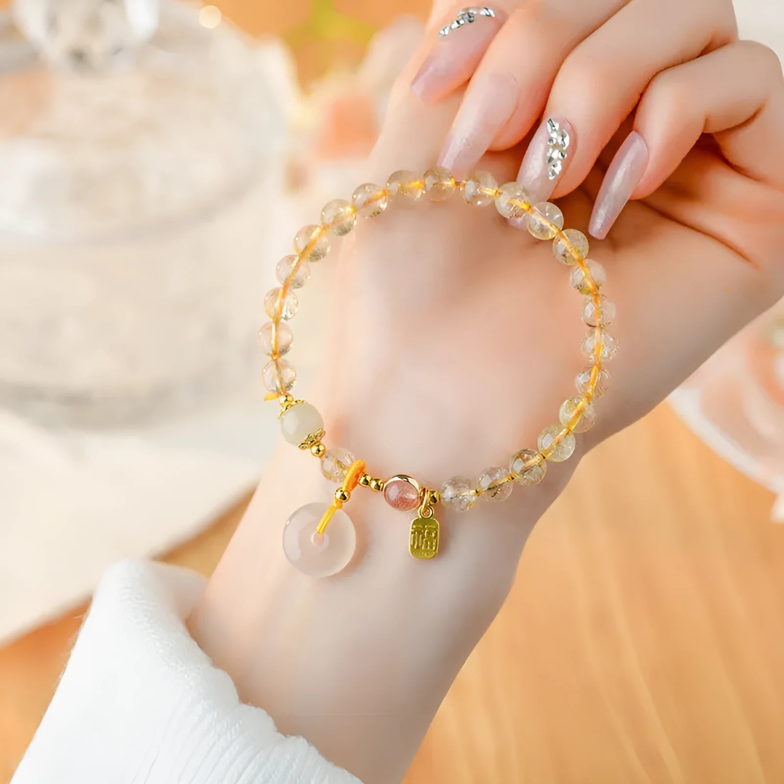 Gold rutilated quartz bracelet with safety buckle and geometric pendant in national style