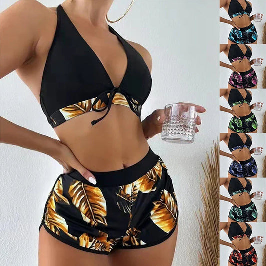 Stylish leaf print bikini with shorts in a variety of vibrant colors, perfect for summer beach or pool wear.