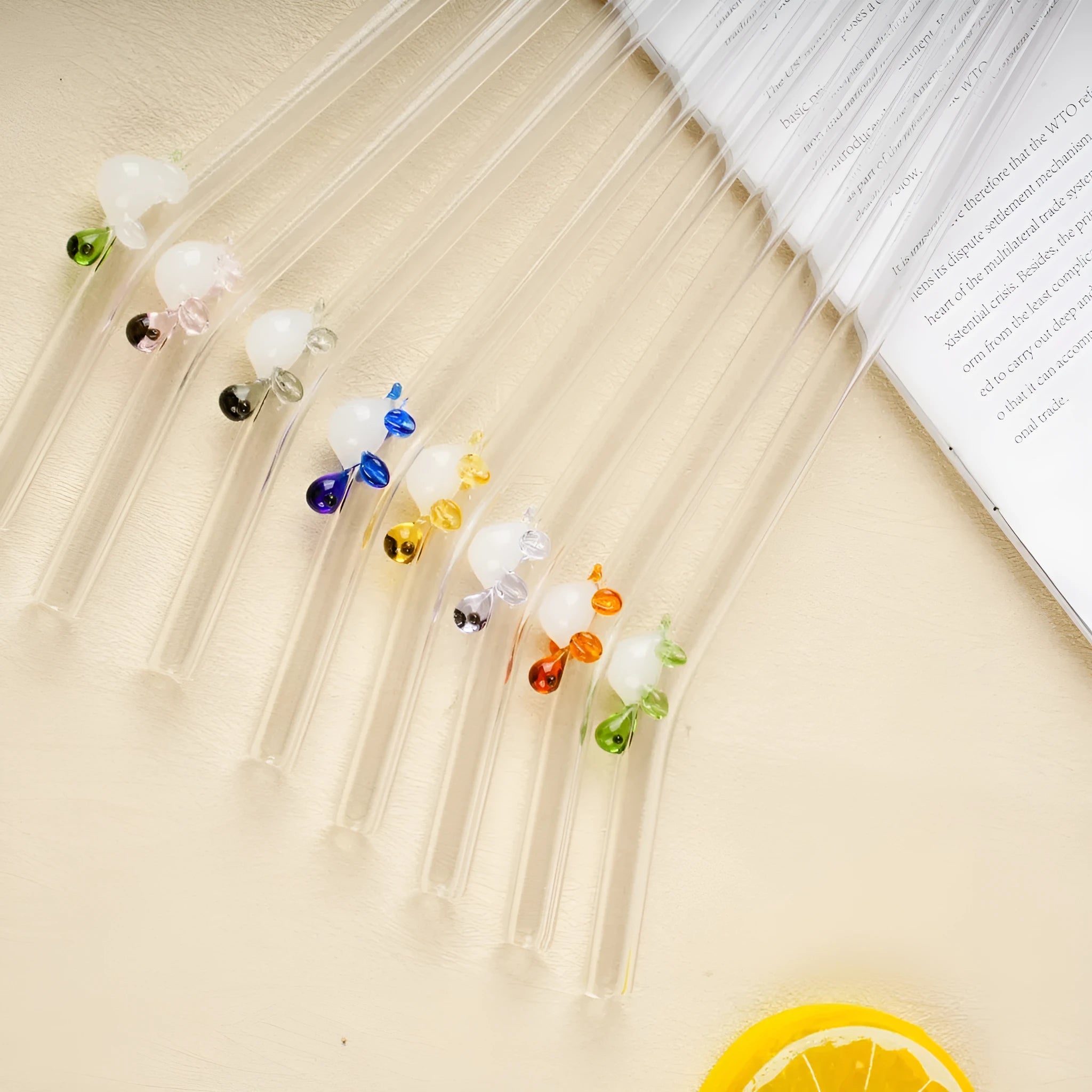High borosilicate glass straw with elbow bend for children in multiple colours on white background