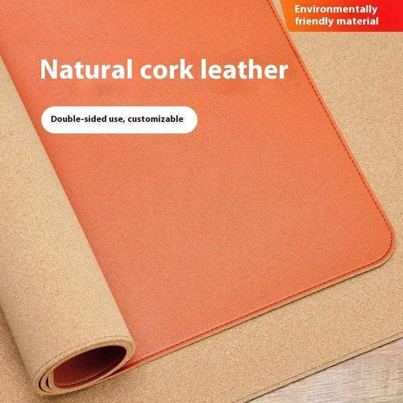 Leather cork PVC mouse mat in orange, 3.8mm thick, 80x40cm, on a wooden desk with a laptop and mouse