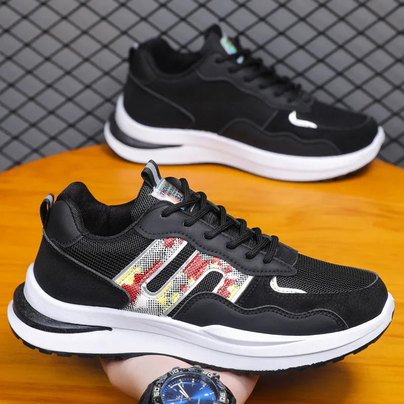 Men's mesh casual sports shoes in white green, black, and grey colours with shallow cut design