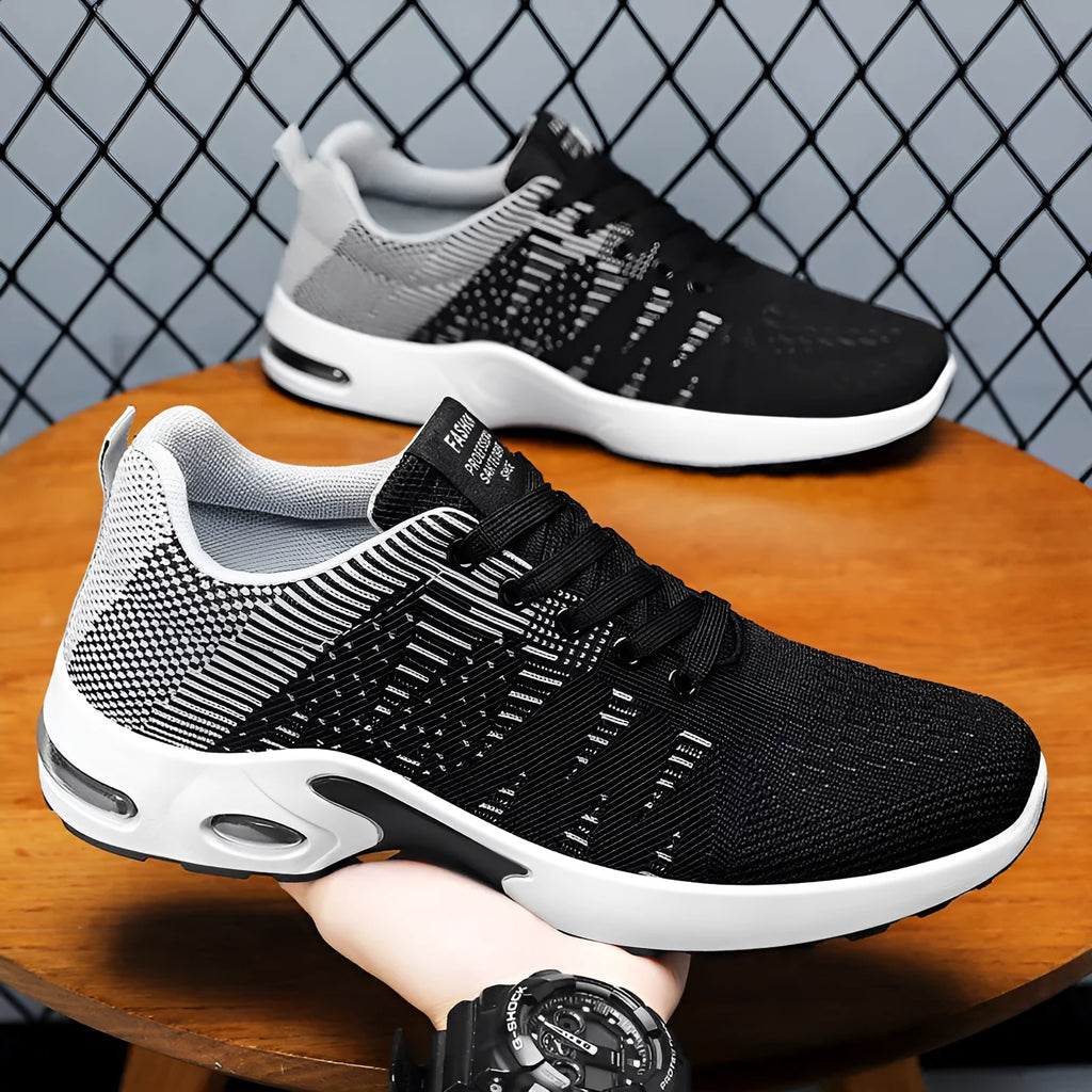 Men's low-top black and grey casual sneakers with breathable mesh upper and flat sole