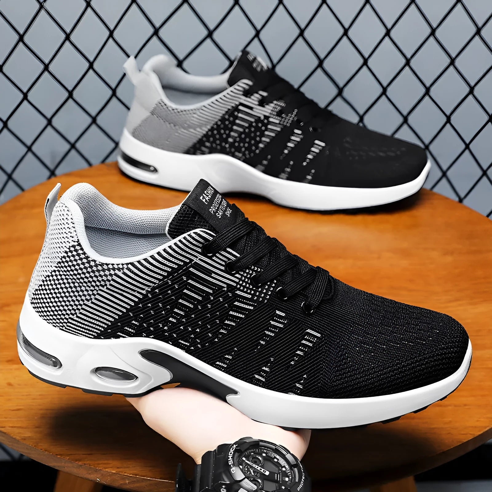 Men's low-top black and grey casual sneakers with breathable mesh upper and flat sole