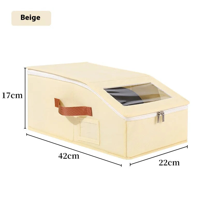 Grey foldable woven fabric storage box with lid, shown with dimensions 42cm long by 22cm wide by 17cm high.