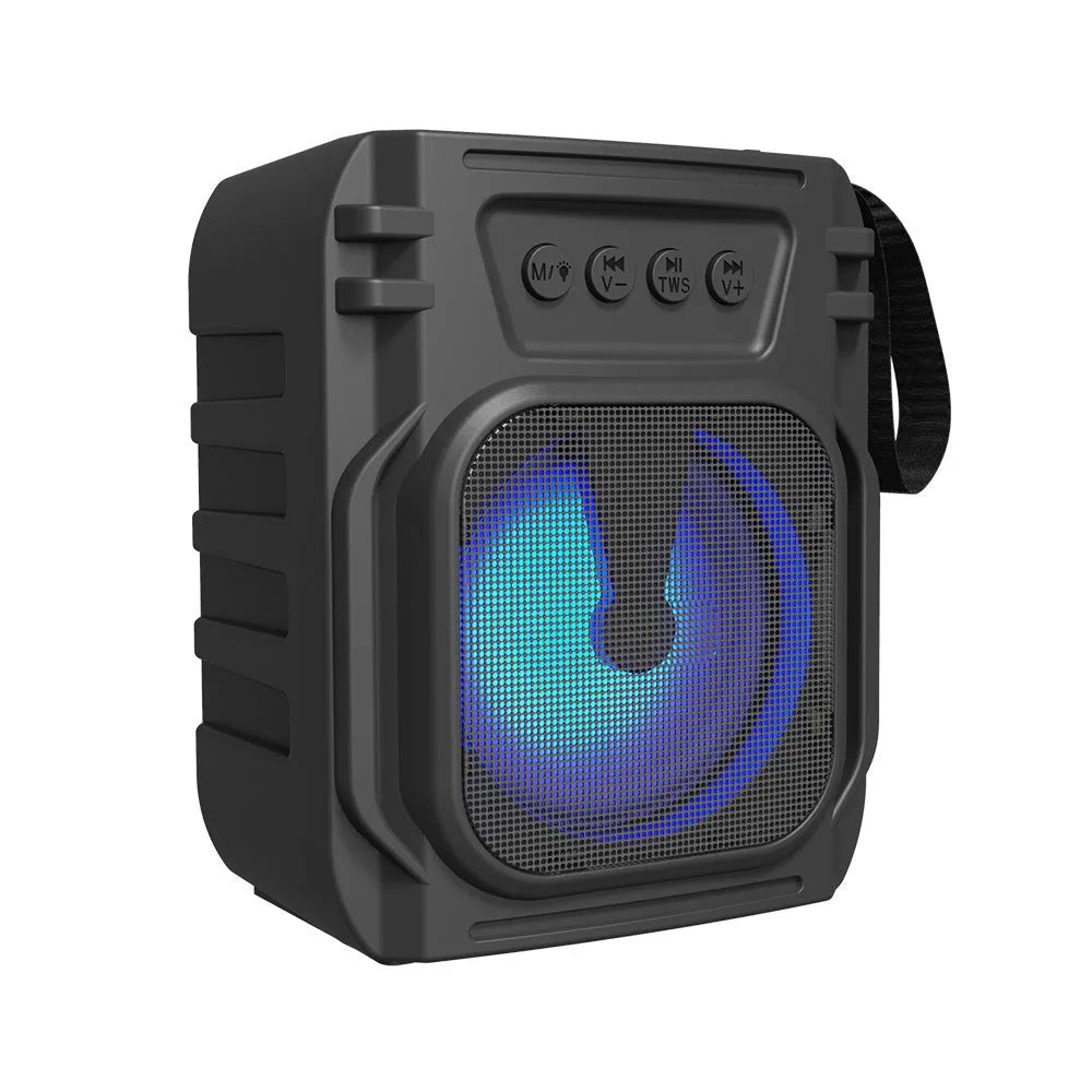 Small portable Bluetooth speaker in colour 3107 with USB charging cable.
