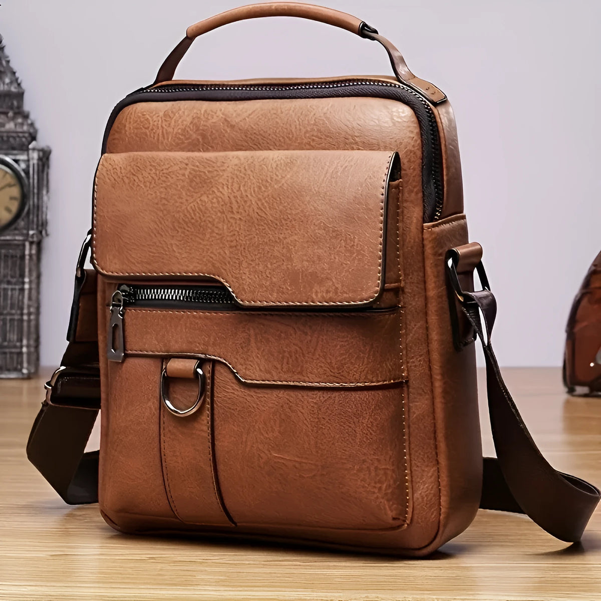 Brown men's PU leather crossbody shoulder bag with adjustable strap, top handle, multiple pockets, and card holder wallet.