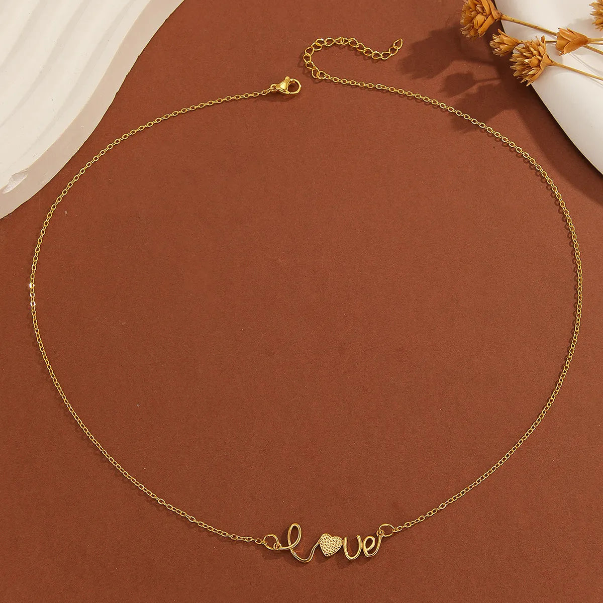 Gold plated copper infinity symbol pendant necklace with sparkling diamond inlay and gold fine chain