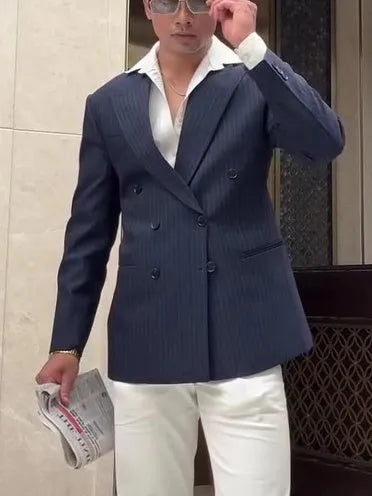 Men's striped double-breasted blazer on hanger showing regular length and structured front
