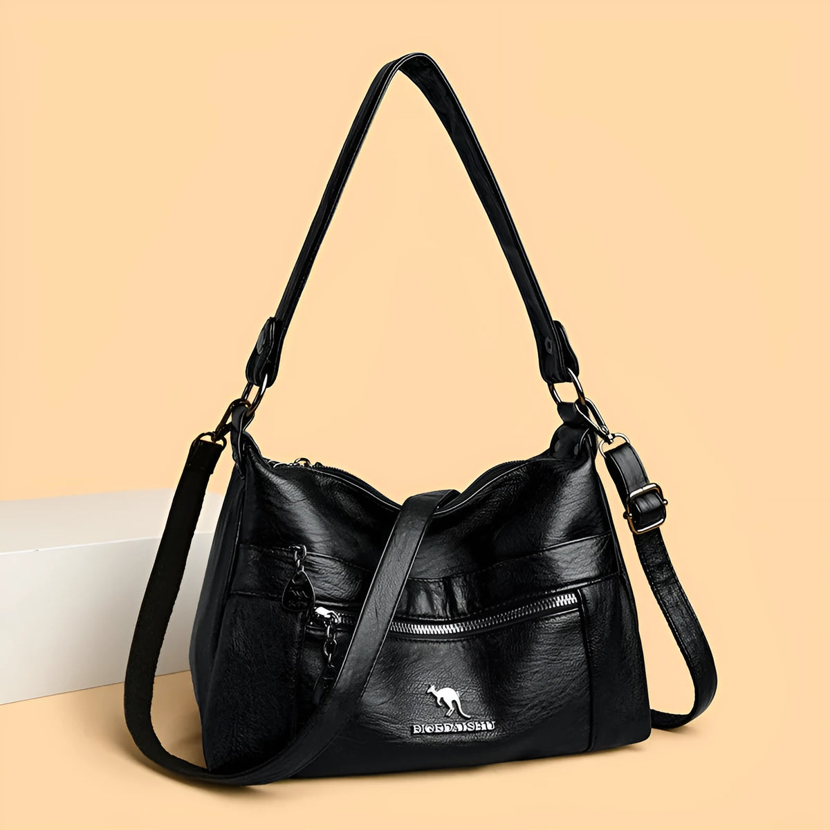Genuine leather double-sided kangaroo crossbody bag in black with belt decoration and soft sheepskin finish.