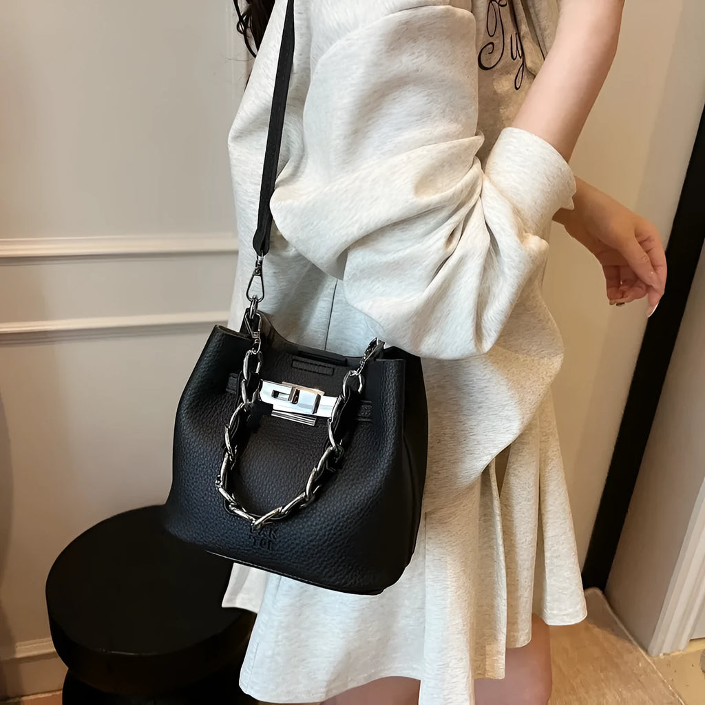Retro black PU leather bucket shoulder bag with chain detail and adjustable strap