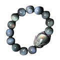 Obsidian bracelet carved with fox or zodiac animal design in cartoon style