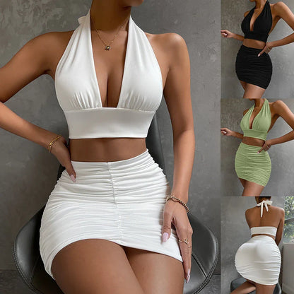 Stylish 2-piece dress set for women featuring a halter top with lace-up detail and a pleated skirt in various colors