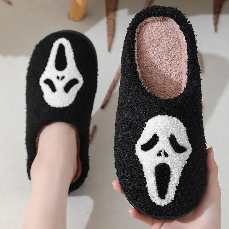 Halloween skull print indoor slippers with suede upper, cotton lining, and non-slip rubber sole in white, red, black, or red black.