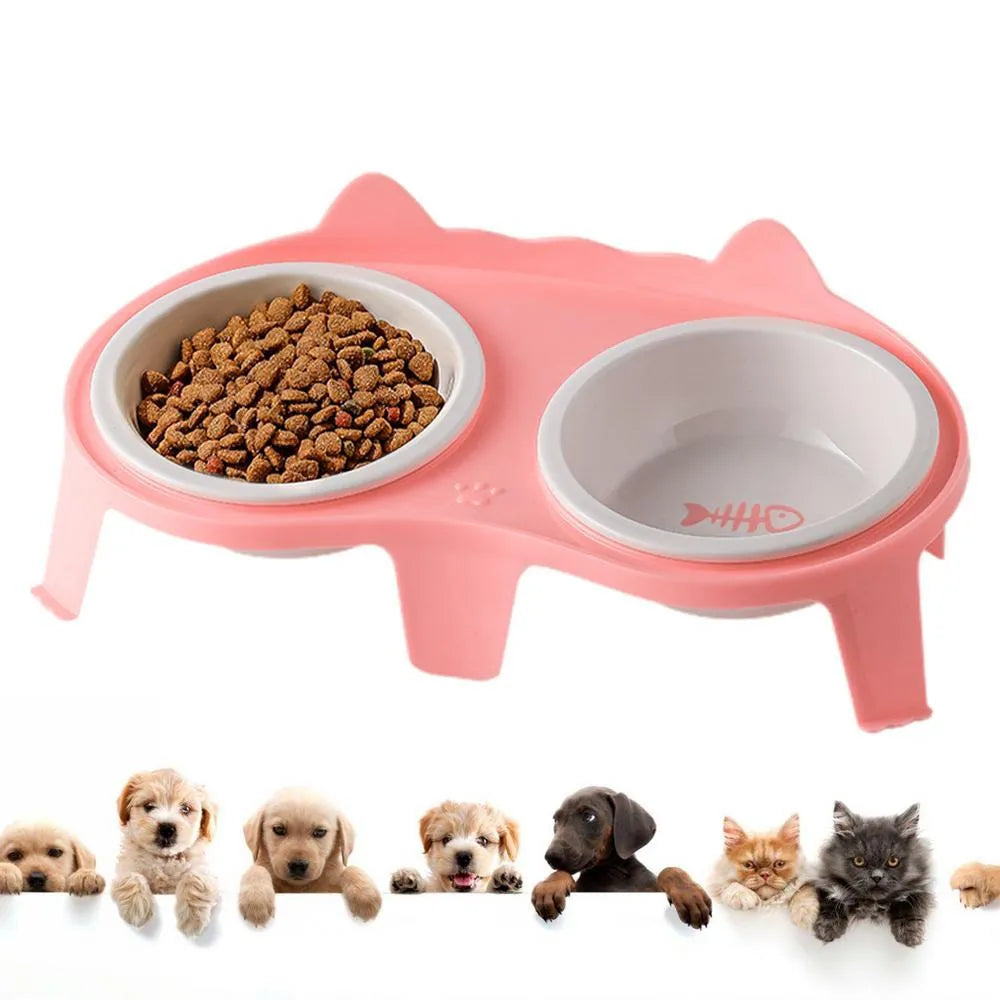 Blue ceramic cat food and water bowls in a white elevated plastic stand with a hook.