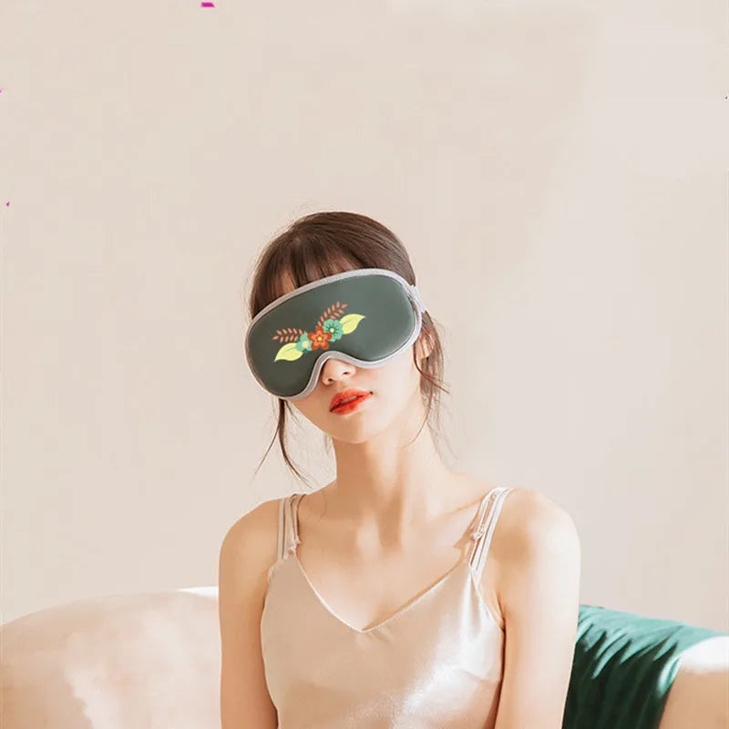 Portable Eye SPA Mask in pink or green with suede shell and USB cable