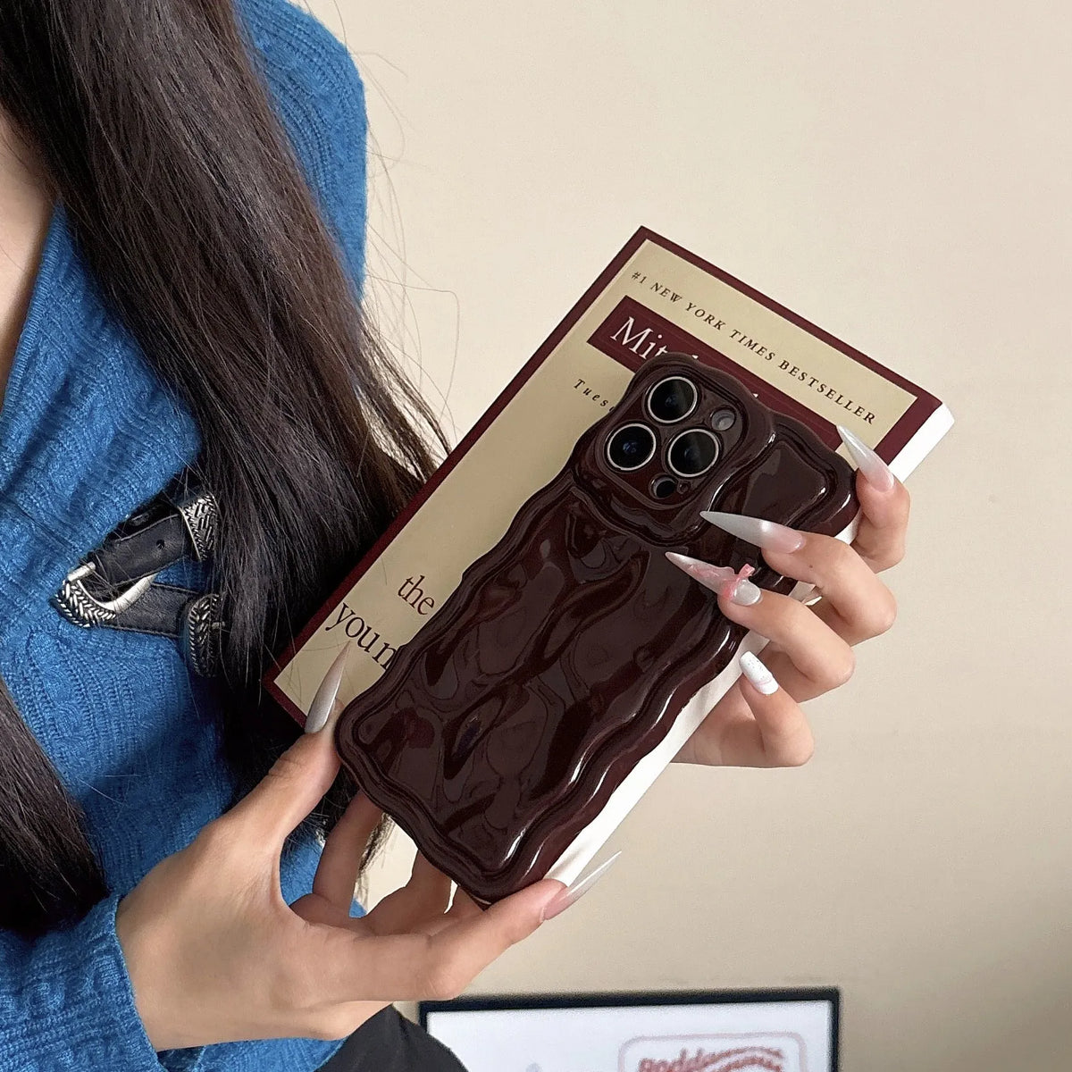Water ripple TPU iPhone case in light pink with anti-fall and anti-fingerprint finish, oil-filled wave texture