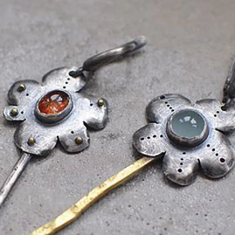 Retro style two-tone geometric drop earrings with asymmetric floral design