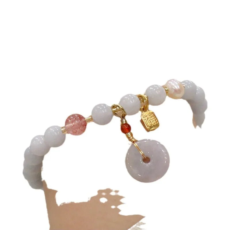Women's handmade artificial crystal bracelet with gold-plated chain and charm pendant