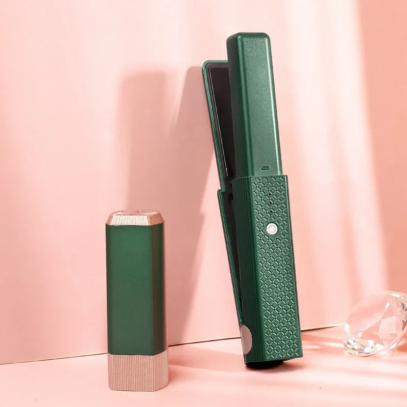 Compact pink cordless USB hair straightener and curler with ceramic plates on a white background.