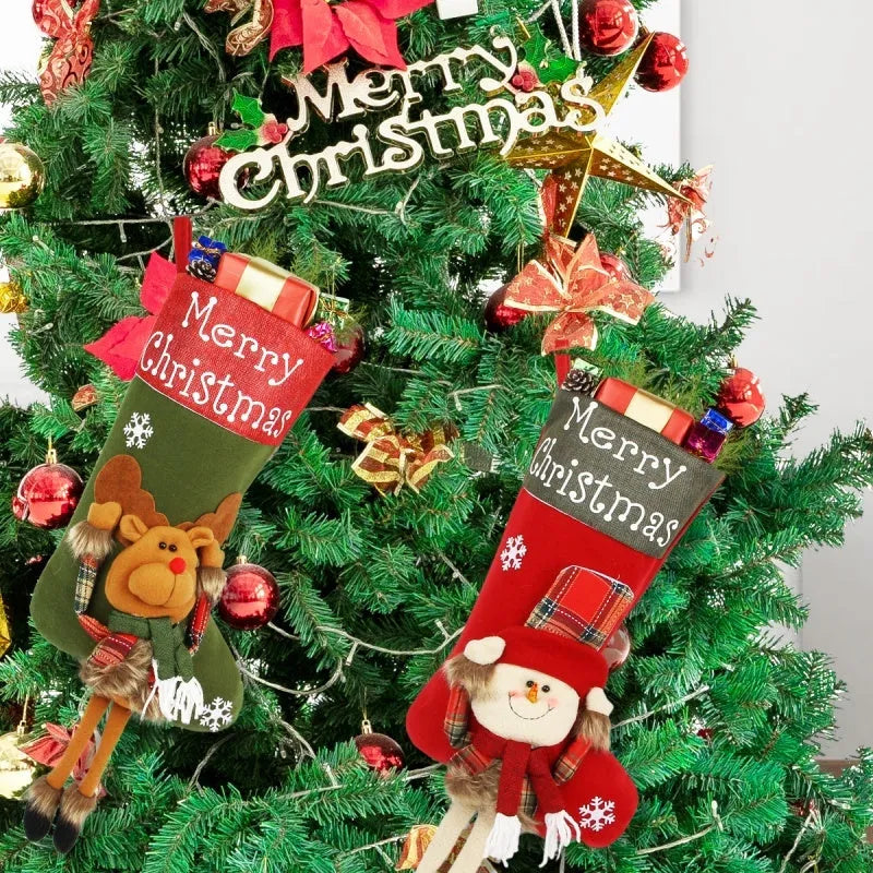 Three large Christmas stockings with Santa, Snowman and Reindeer designs hanging from a mantelpiece
