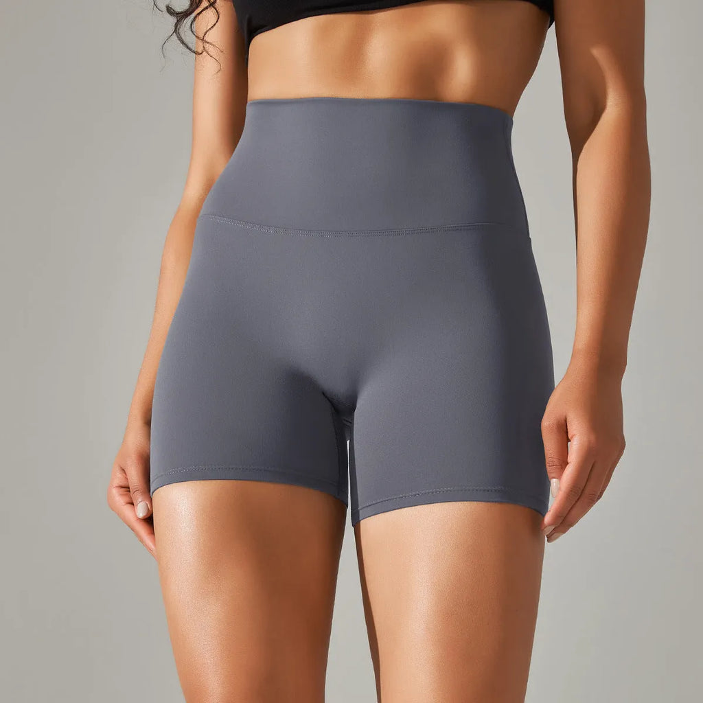 Women's high waist fitness tights in dark green for belly control and hip lift during exercise