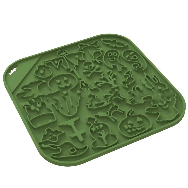 Silicone slow feeder dog bowl with anti-tumble base in Halloween colour theme on a kitchen floor