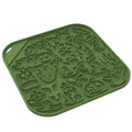 Silicone slow feeder dog bowl with anti-tumble base in Halloween colour theme on a kitchen floor
