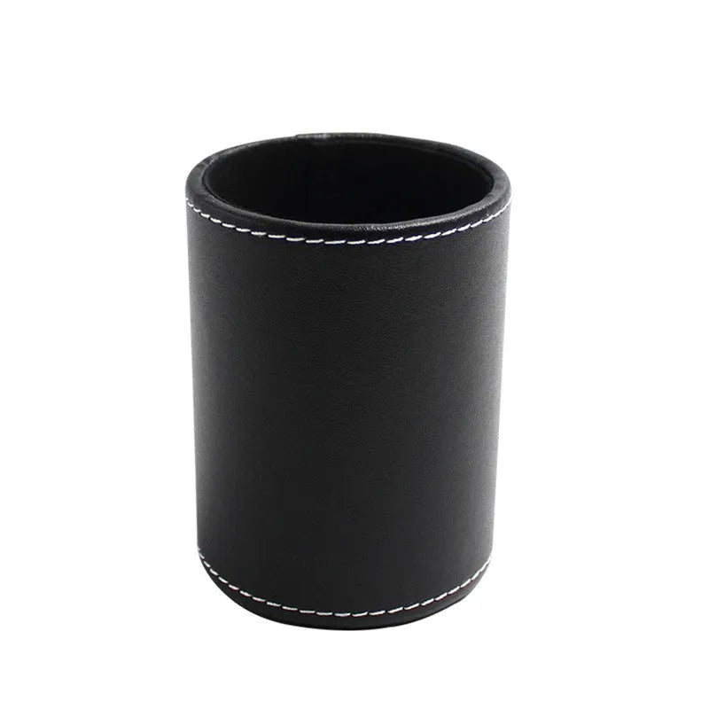 Round black leather pen holder with 8.0cm diameter on desk