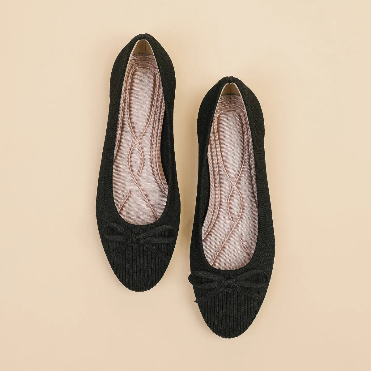 Women's butterfly print flat fabric pumps with round toe and flat heel on a white background.