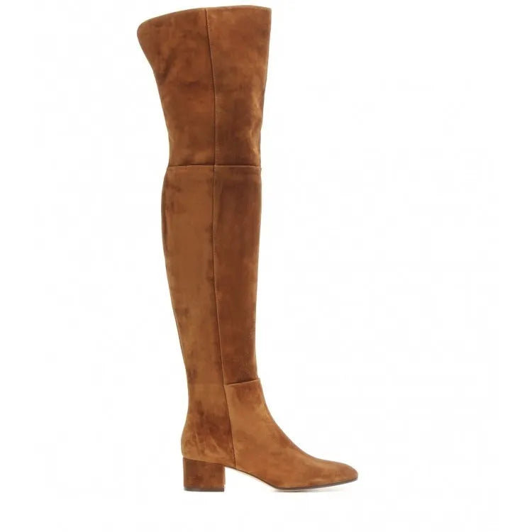 Women's grey suede over-the-knee flat boots with a pointed toe and low thick heel on a neutral background.