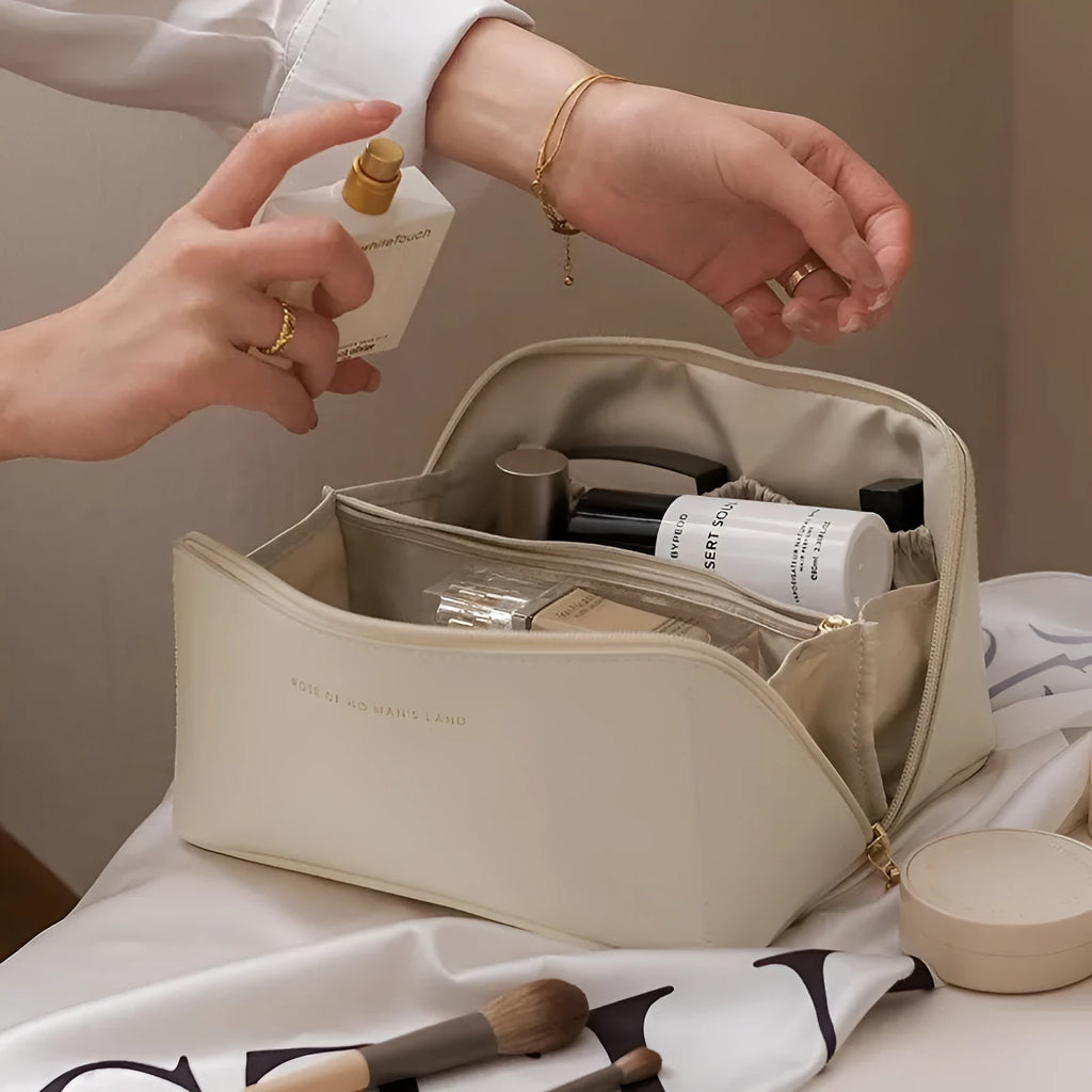 Large capacity travel makeup storage bag in brown PU leather with solid colour finish on white background