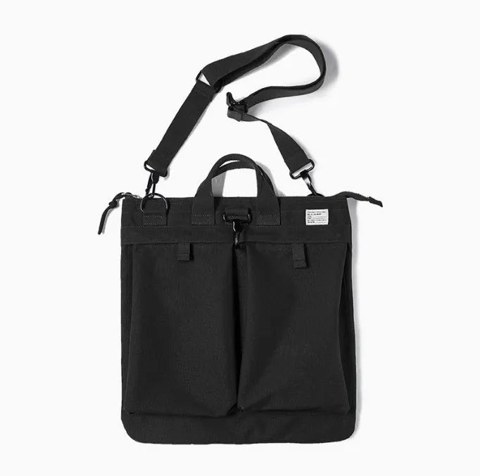 Canvas crossbody messenger bag in retro style showing military green colour with shoulder strap
