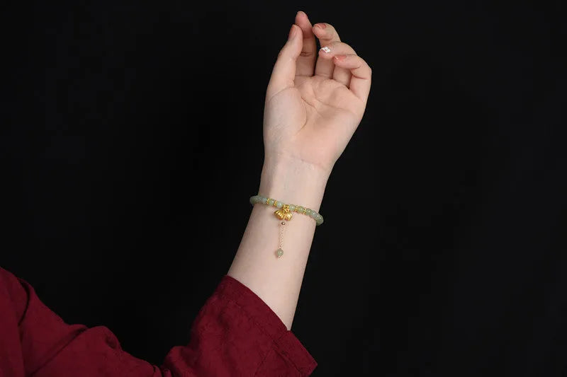 Natural Hetian jade bracelet with lotus carving and fu symbols on 6mm beads
