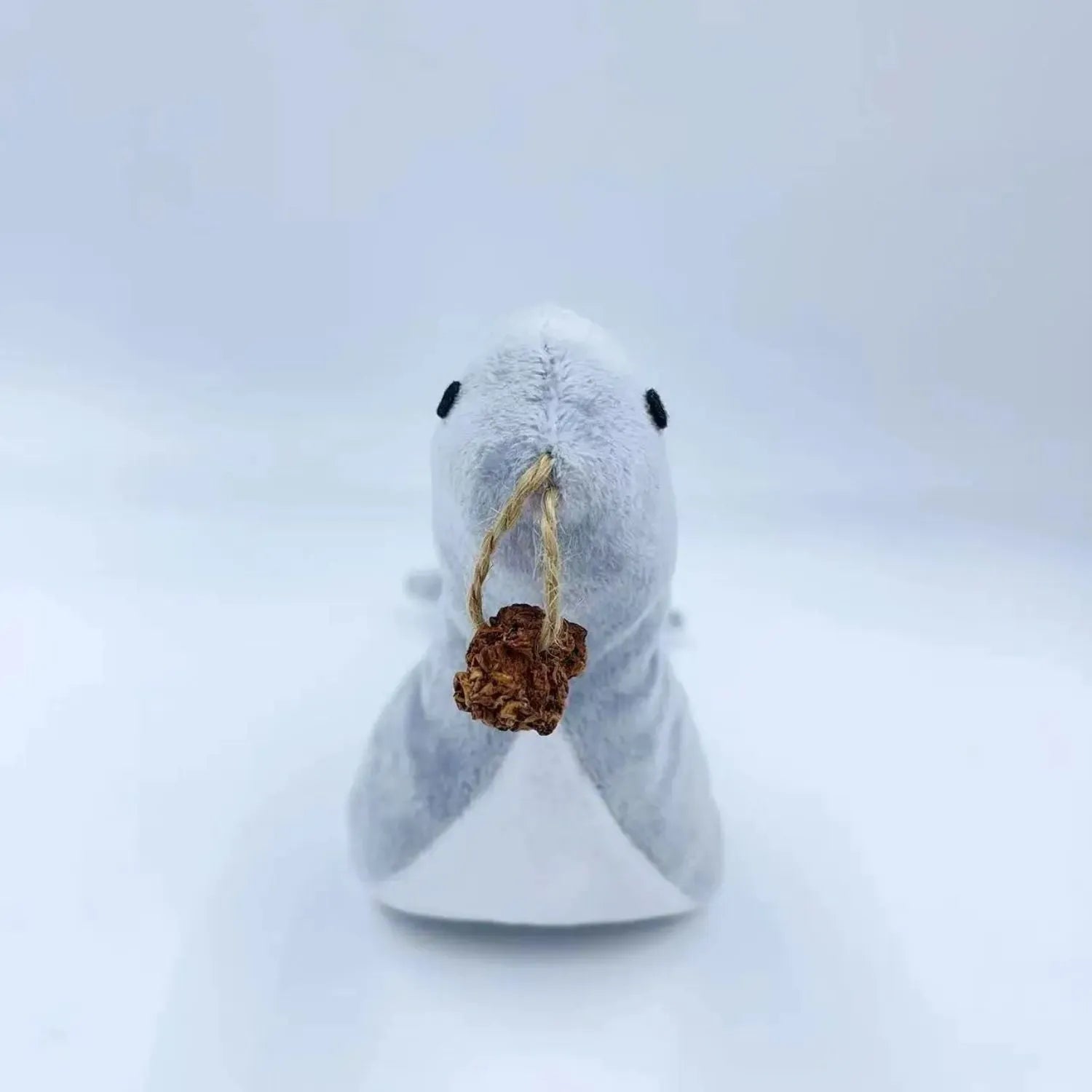 Blue sea lion plush cat toy with bell and catnip for teeth grinding and interactive play
