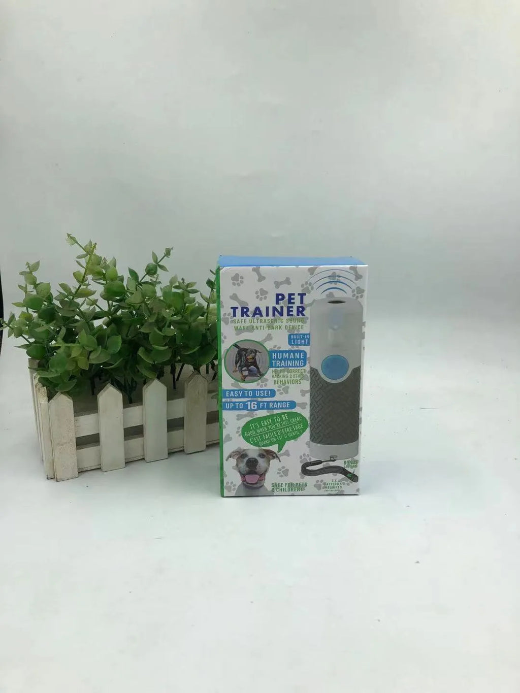 White ABS plastic ultrasonic dog trainer handheld device for barking correction