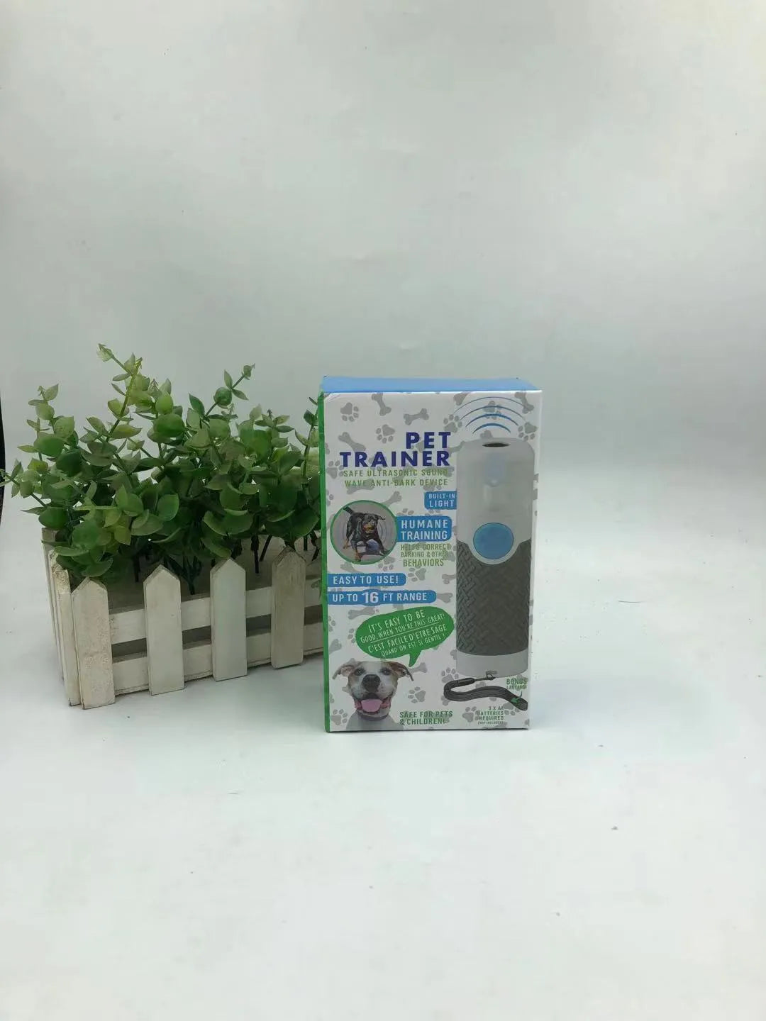 White ABS plastic ultrasonic dog trainer handheld device for barking correction