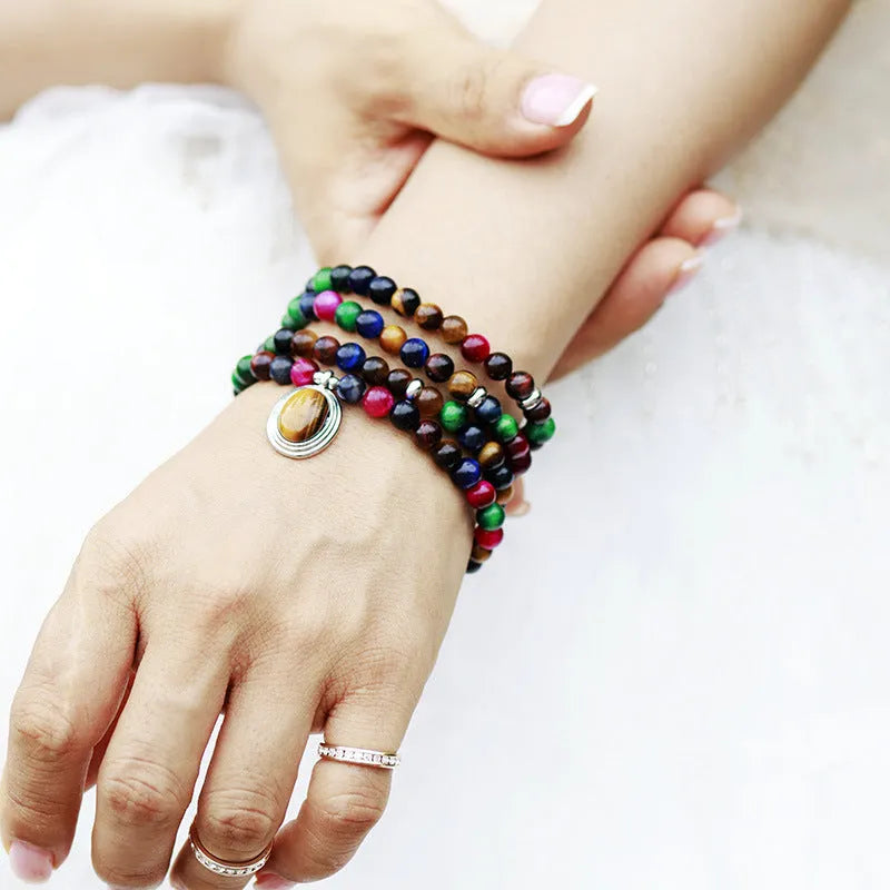 Natural stone meditation necklace bracelet with 108 pendants showing colour tiger-eye beads and mixed gem charms