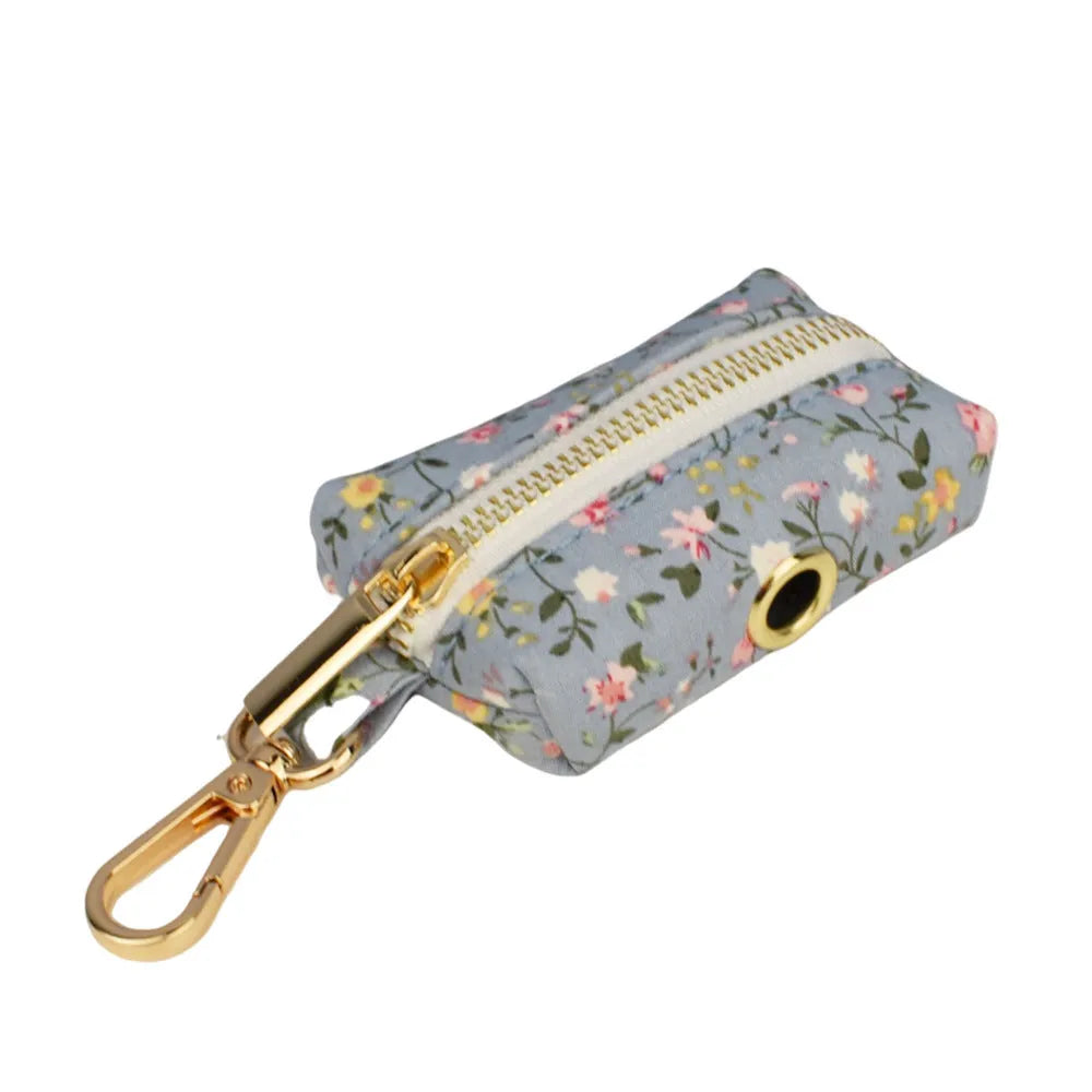 Blue floral polyester cotton dog collar set with matching leash, bow, vest and waste bag holder accessories