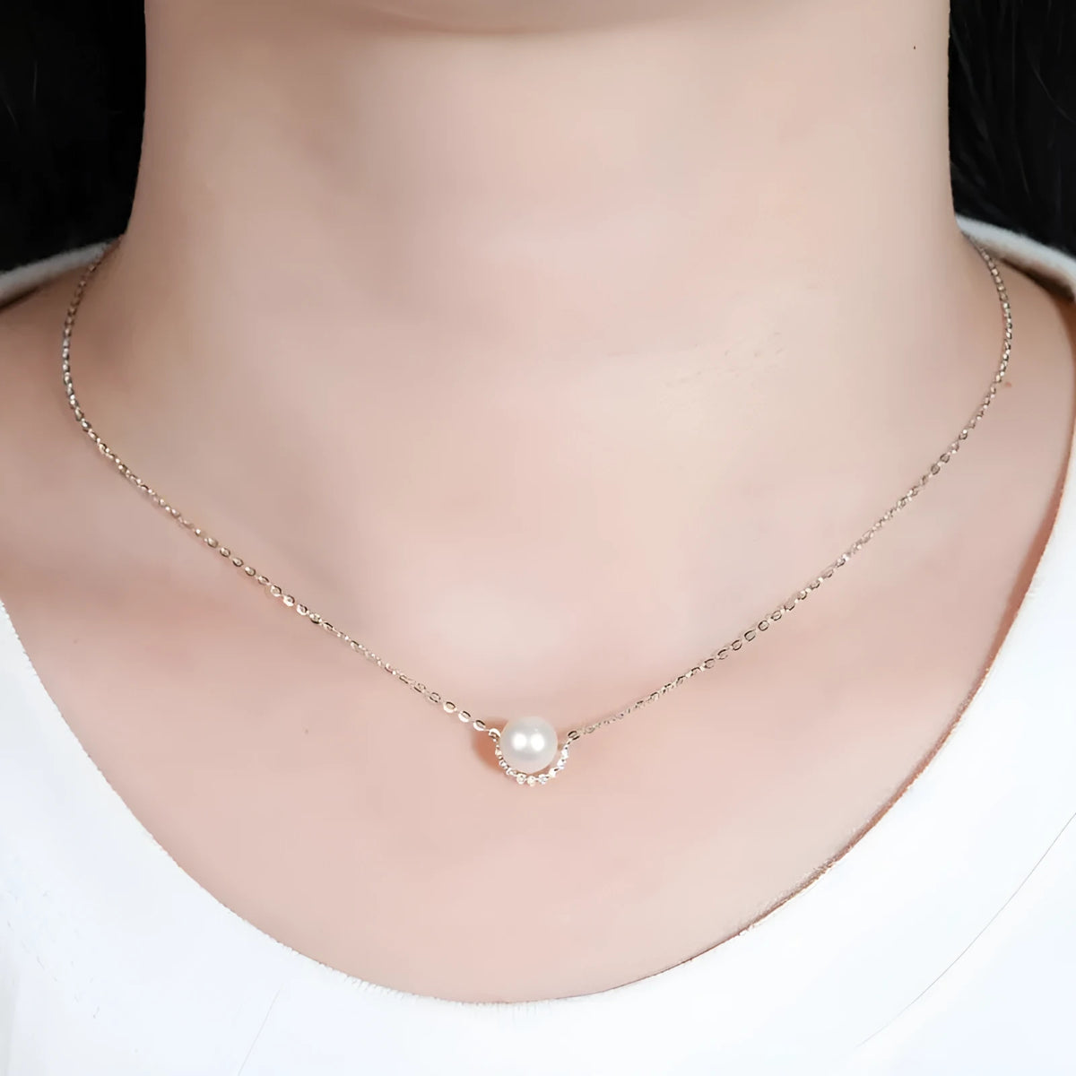 Women's 925 sterling silver geometric pendant necklace with pearl inlay and rhinestone accents, available in gold colour finish.