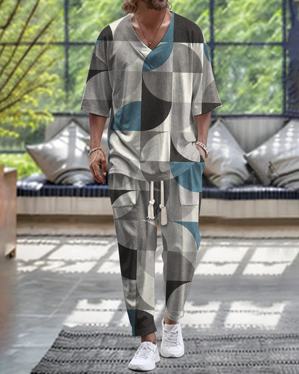 Women's cropped sleeve V-neck trousers suit in thin polyester fabric showing jacket and matching trousers