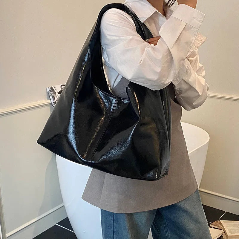 One shoulder tote bag in cream yellow with square vertical shape, outer slit pocket, internal phone bag, PU outer and polyester lining